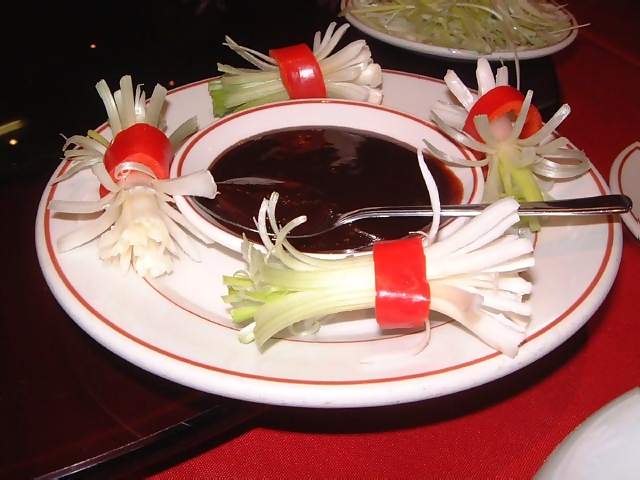 Food Chinese plum sauce for roast suckling pig and dumplings like crispy fried duck but pork