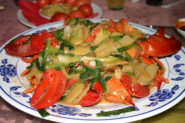 Food Plate of Chinese steamed Lobster with assorted vegetables