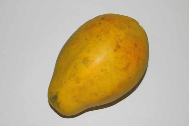 Fruit Ripe yellow and green paw paw or papaya