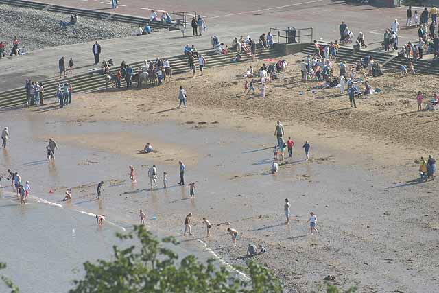People Summer bathers on the beach at Llandudno in North Wales