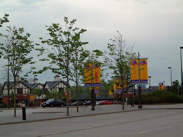 Views Empty car park in the evening at Cheshire Oaks shopping mall