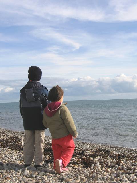 Two Children Looking Out to Sea in the English Channel