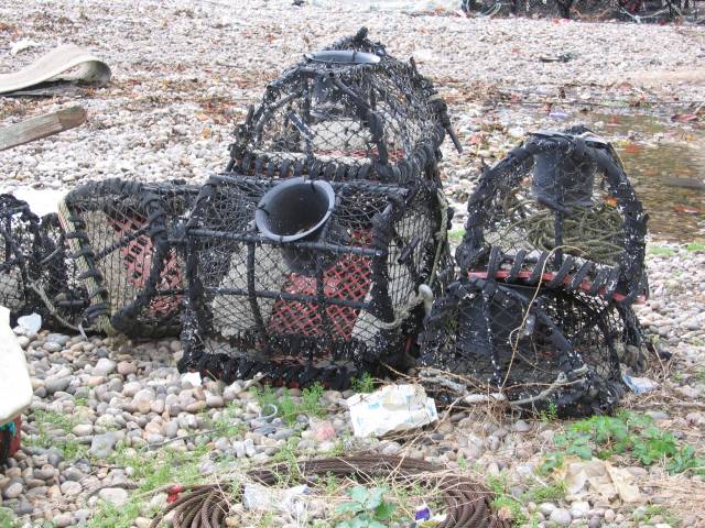 Lobster Pots On Stoney Devon Beach